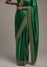 Bottle Green Saree In Satin Blend With Sequins And Zardosi Embroidered Border Design And Unstitched Blouse Online - Kalki Fashion