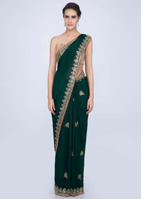 Bottle green satin chiffon saree with cut dana and mirror embroidered butti and border only on Kalki