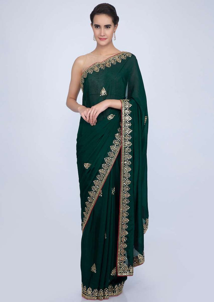 Bottle green satin chiffon saree with cut dana and mirror embroidered butti and border only on Kalki