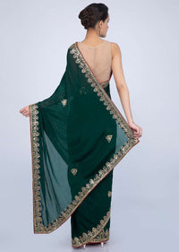 Bottle green satin chiffon saree with cut dana and mirror embroidered butti and border only on Kalki