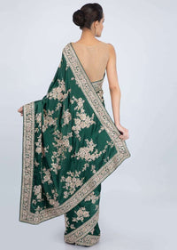 Bottle Green Saree In Satin With Floral Butti And Embroidered Border Online - Kalki Fashion