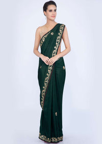 Bottle green silk saree with embroidered butti and border only on Kalki