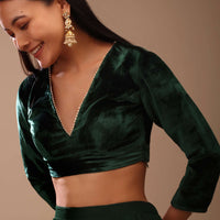 Bottle Green Blouse In Velvet With Gotta Patti Edged V Neckline And Three Quarter Sleeves