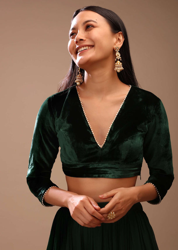 Bottle Green Blouse In Velvet With Gotta Patti Edged V Neckline And Three Quarter Sleeves