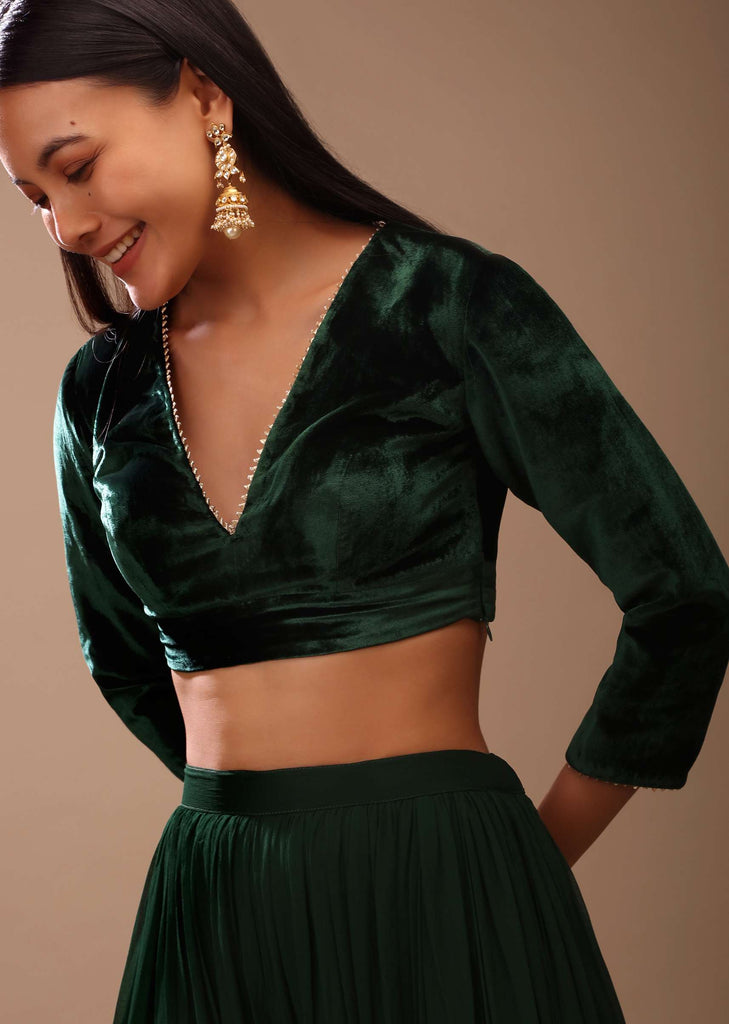 Bottle Green Blouse In Velvet With Gotta Patti Edged V Neckline And Three Quarter Sleeves