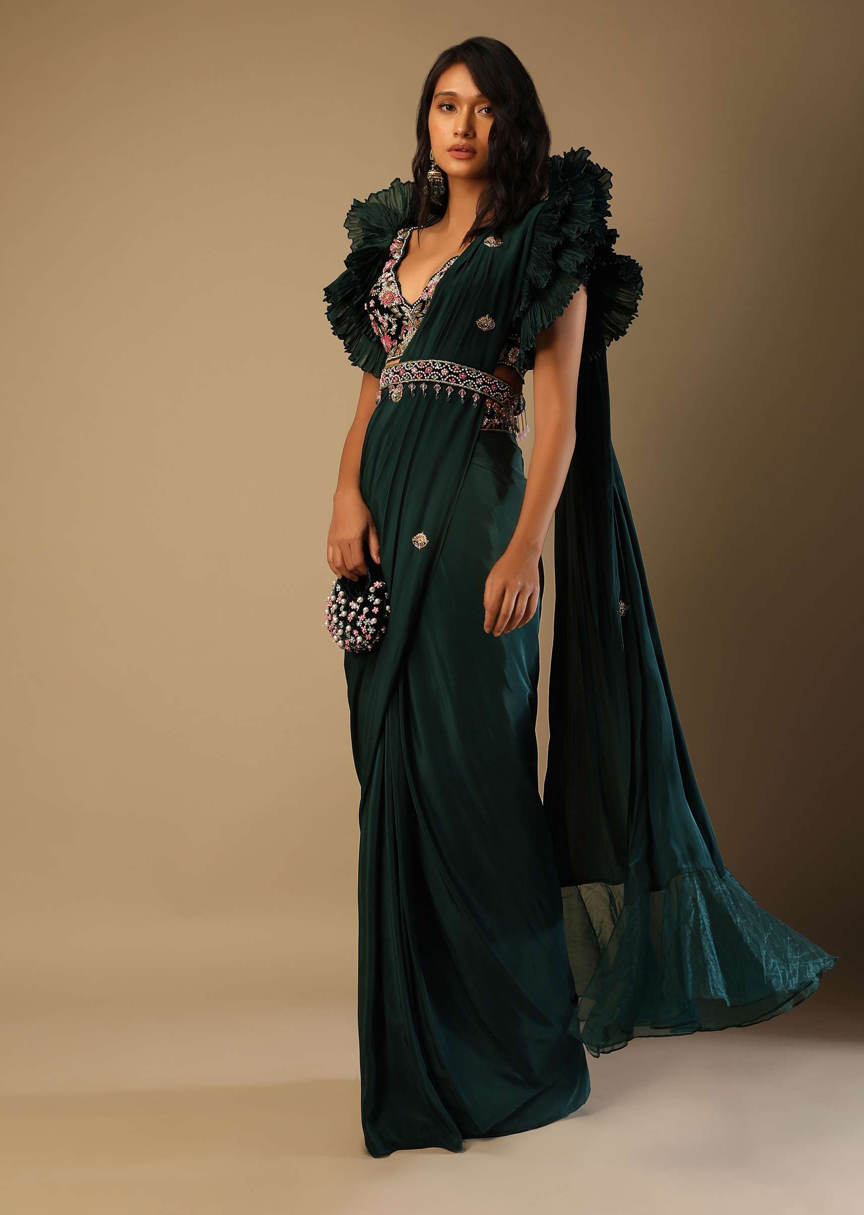 Bottle Green Ready Pleated Saree With A Colorful Hand Embroidered Blouse With Fancy Layered Frill Sleeves