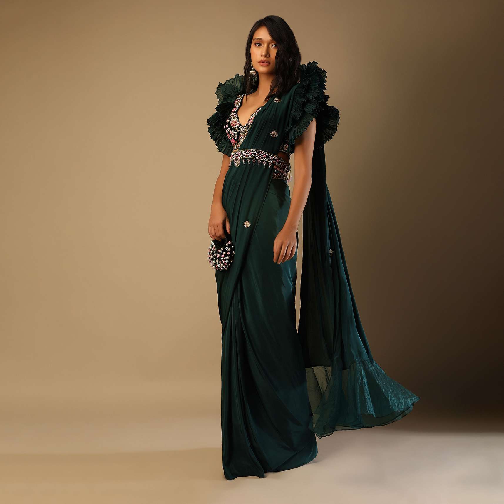 Bottle Green Ready Pleated Saree With A Colorful Hand Embroidered Blouse With Fancy Layered Frill Sleeves