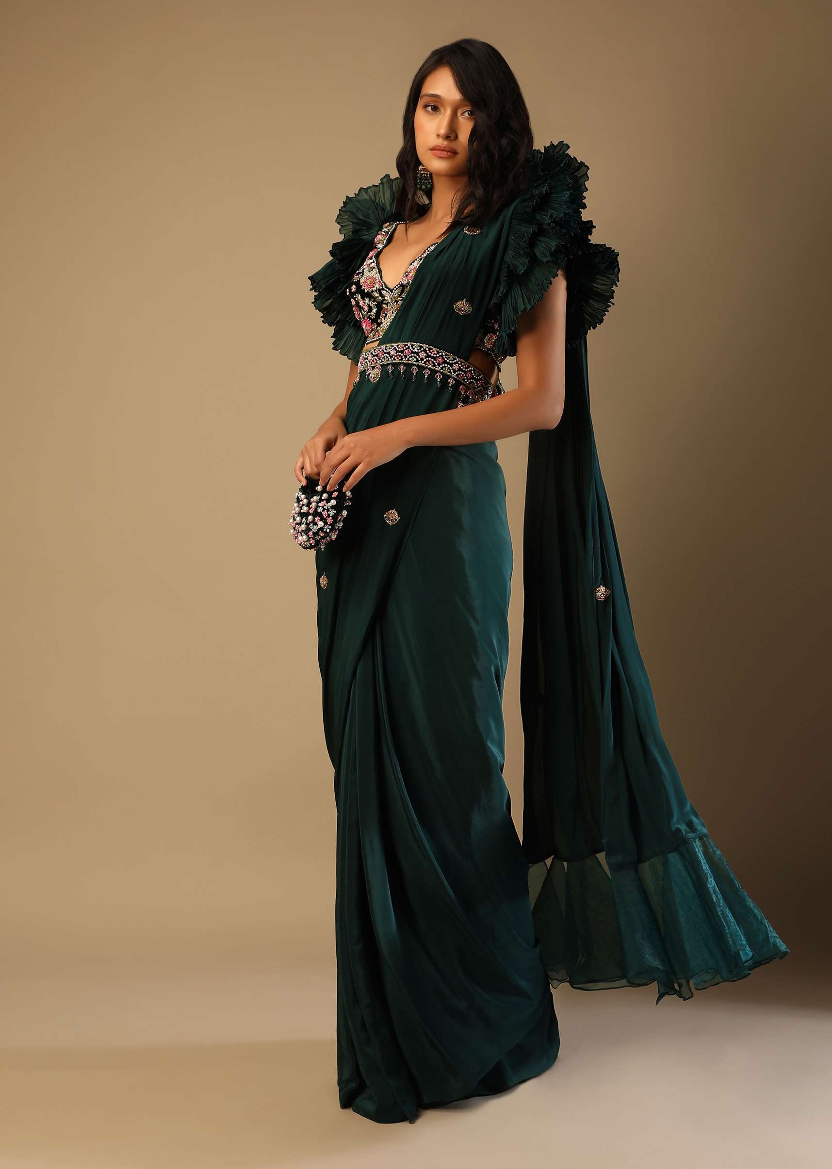 Bottle Green Ready Pleated Saree With A Colorful Hand Embroidered Blouse With Fancy Layered Frill Sleeves