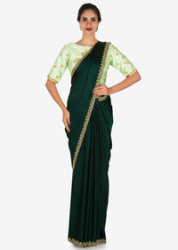 Bottle Green Saree With Mustard Blouse Carved In Heavy Cut Dana Embroidery Work Online - Kalki Fashion