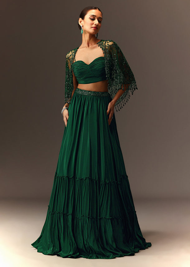 Bottle Green Tiered Lehenga With Net Cape