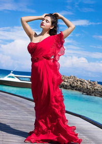 Bright Red Ready Pleated Saree With Ruffled Pallo Paired With A Strapless Hand Embroidered Blouse