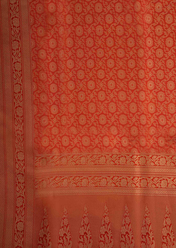 Bright red saree in chanderi silk with weaved jaal and floral butti