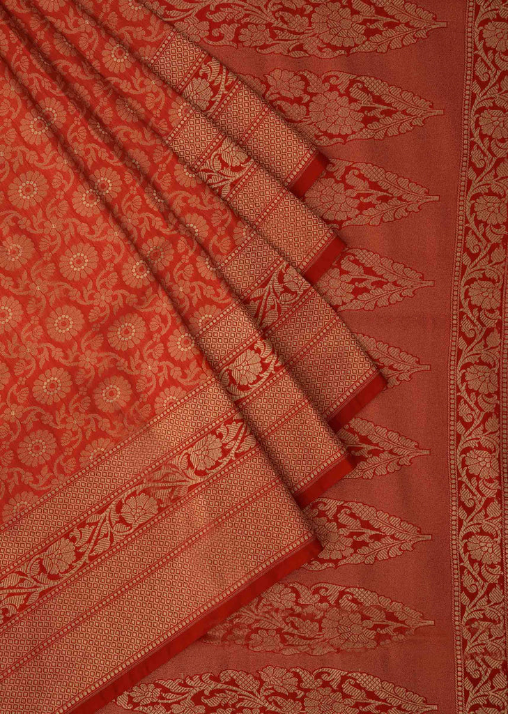 Bright red saree in chanderi silk with weaved jaal and floral butti