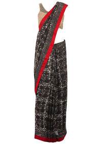 Brown and cream saree in jaal print only on Kalki