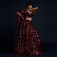 Burgundy Lehenga Embellished In Sequins With A Velvet Crop Top And Matching Belt Bag