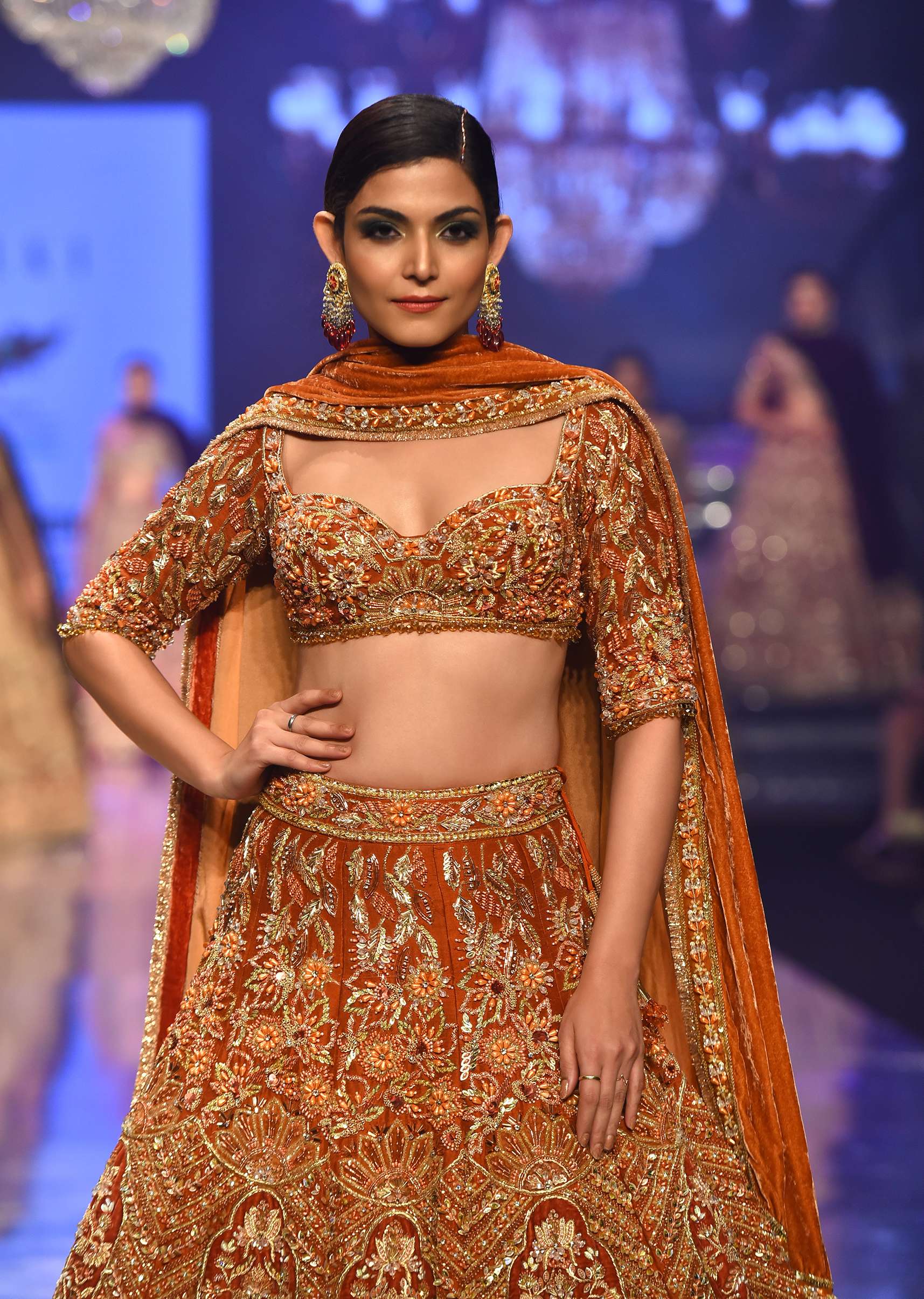 Burnt Orange Titian Bridal Lehenga In Raw Silk - NOOR 2022