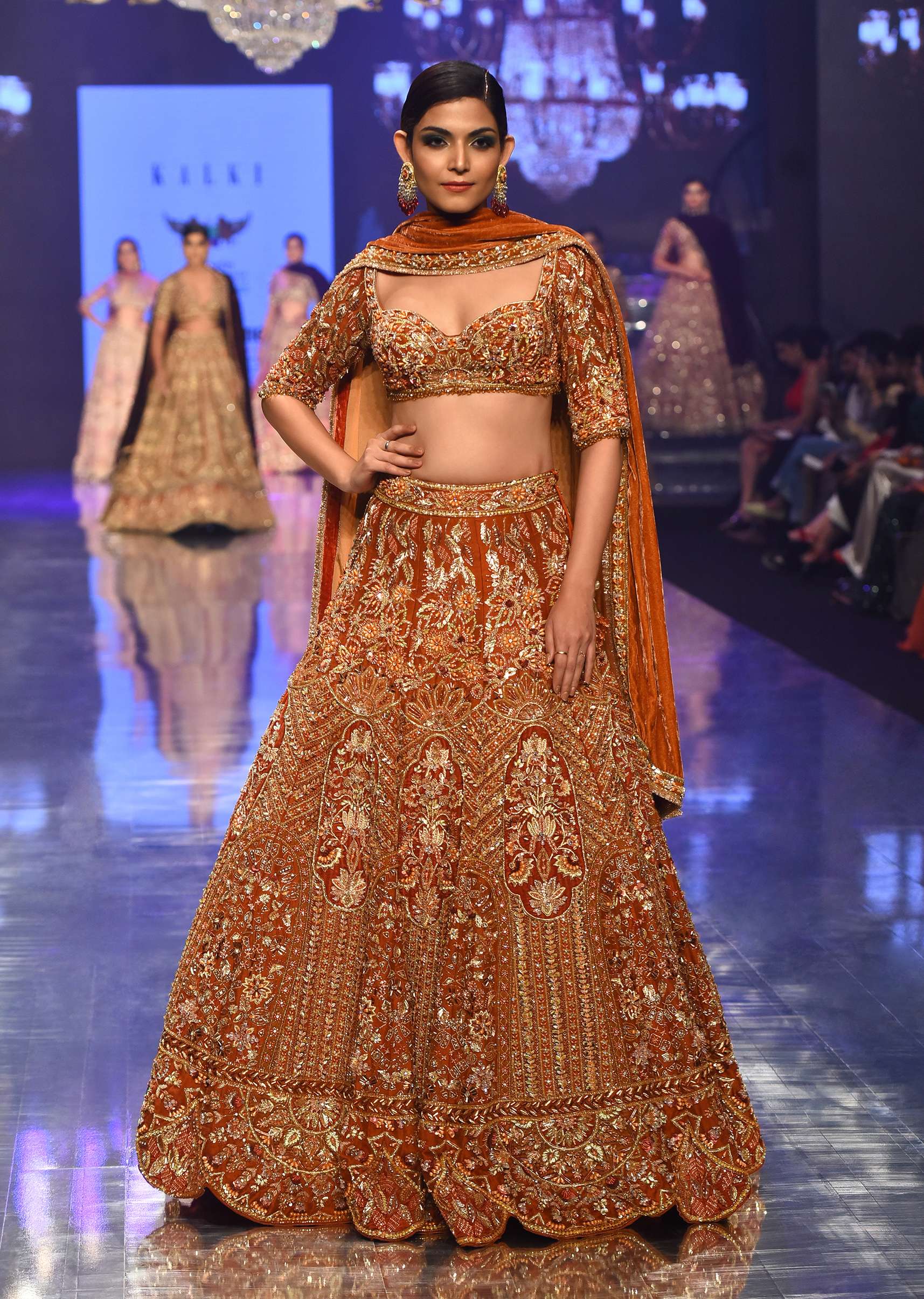 Burnt Orange Titian Bridal Lehenga In Raw Silk - NOOR 2022