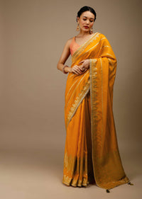 Cadmium Yellow Saree In Dola Silk With Lurex Woven Stripes On The Pallu And Geometric Floral Motifs On The Pleats