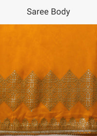 Cadmium Yellow Saree In Dola Silk With Lurex Woven Stripes On The Pallu And Geometric Floral Motifs On The Pleats