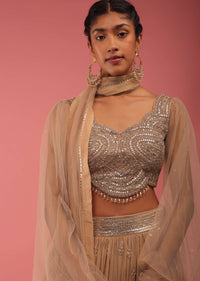 Camel Brown Crop Top And Lehenga Set In Gold Sequins Embroidery, Crafted In Georgette With Sequins Fringes On The Border Of The Lehenga