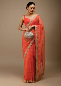 Camelia Orange Saree In Organza With Bandhani Jaal And Gotta Patti Embroidered Floral Motifs On The Border