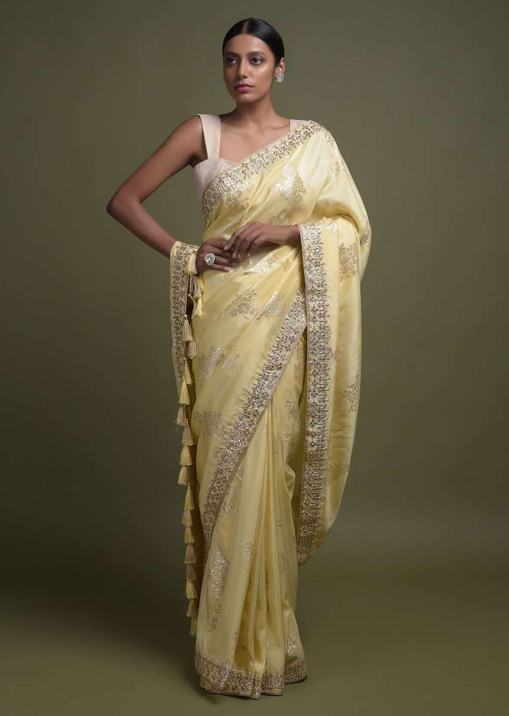 Canary Yellow Saree In Silk Blend With Weaved Floral Motifs In Repeat Pattern Online - Kalki Fashion