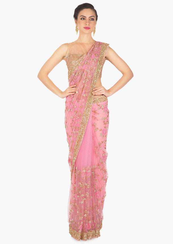 Candy pink saree in net adorn in 3D flower and cut dana jaal embroidery only on Kalki