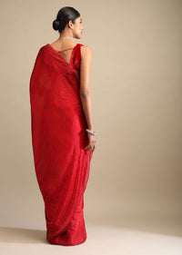 Candy Red Saree In Satin Embellished With Scattered Red And Silver Kundan Along The Border And Unstitched Blouse