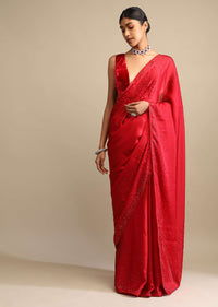 Candy Red Saree In Satin Embellished With Scattered Red And Silver Kundan Along The Border And Unstitched Blouse