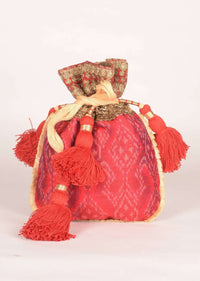 Carmine Red Potli In Ikkat Weave With Red Elaborate Tassel Dori Online - Kalki Fashion