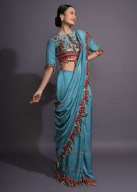 Cerulean Blue Saree With Thread Embroidered Floral Design And Tassels On The Border Online - Kalki Fashion