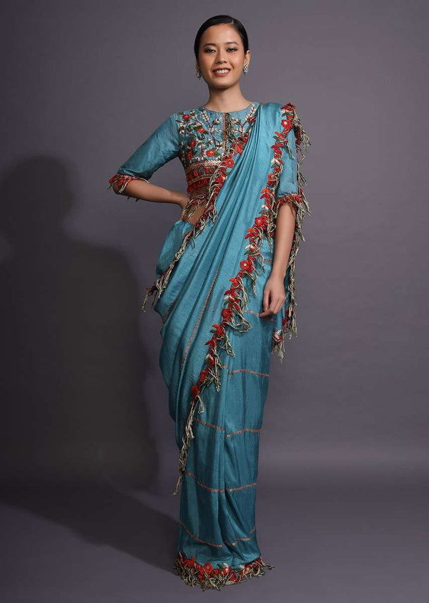 Cerulean Blue Saree With Thread Embroidered Floral Design And Tassels On The Border Online - Kalki Fashion