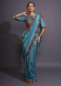 Cerulean Blue Saree With Thread Embroidered Floral Design And Tassels On The Border Online - Kalki Fashion