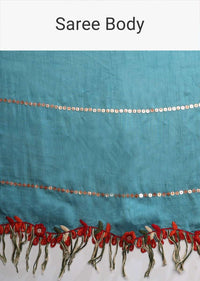 Cerulean Blue Saree With Thread Embroidered Floral Design And Tassels On The Border Online - Kalki Fashion