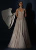 Champagne Embellished Gown With Plunging Neckline And A Fancy Choker With Attached Cape