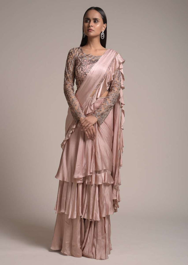 Champagne Pink Ready Pleated Ruffle Saree In Satin With Layered Design And Kundan Embellished Blouse Online - Kalki Fashion