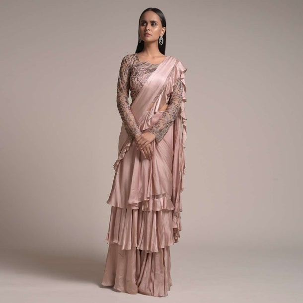 Champagne Pink Ready Pleated Ruffle Saree In Satin With Layered Design And Kundan Embellished Blouse Online - Kalki Fashion