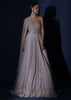 Champagne Strapless Gown With Embroidered Bodice And Fancy Cape Attached To A Choker