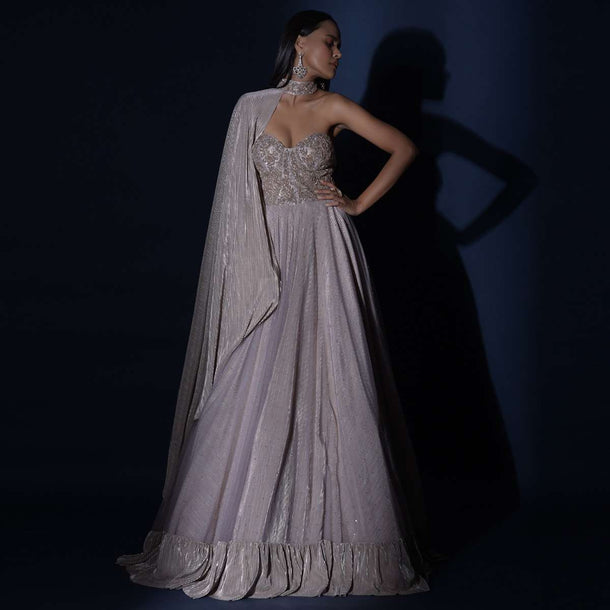 Champagne Strapless Gown With Embroidered Bodice And Fancy Cape Attached To A Choker