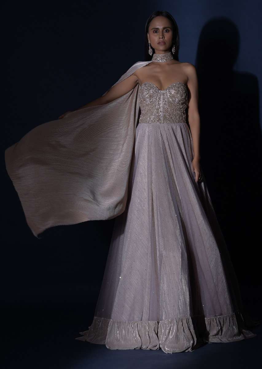 Champagne Strapless Gown With Embroidered Bodice And Fancy Cape Attached To A Choker