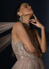 Champagne Tiered Gown With An Embellished Plunging V Cut Bodice And Shimmer Underlayer