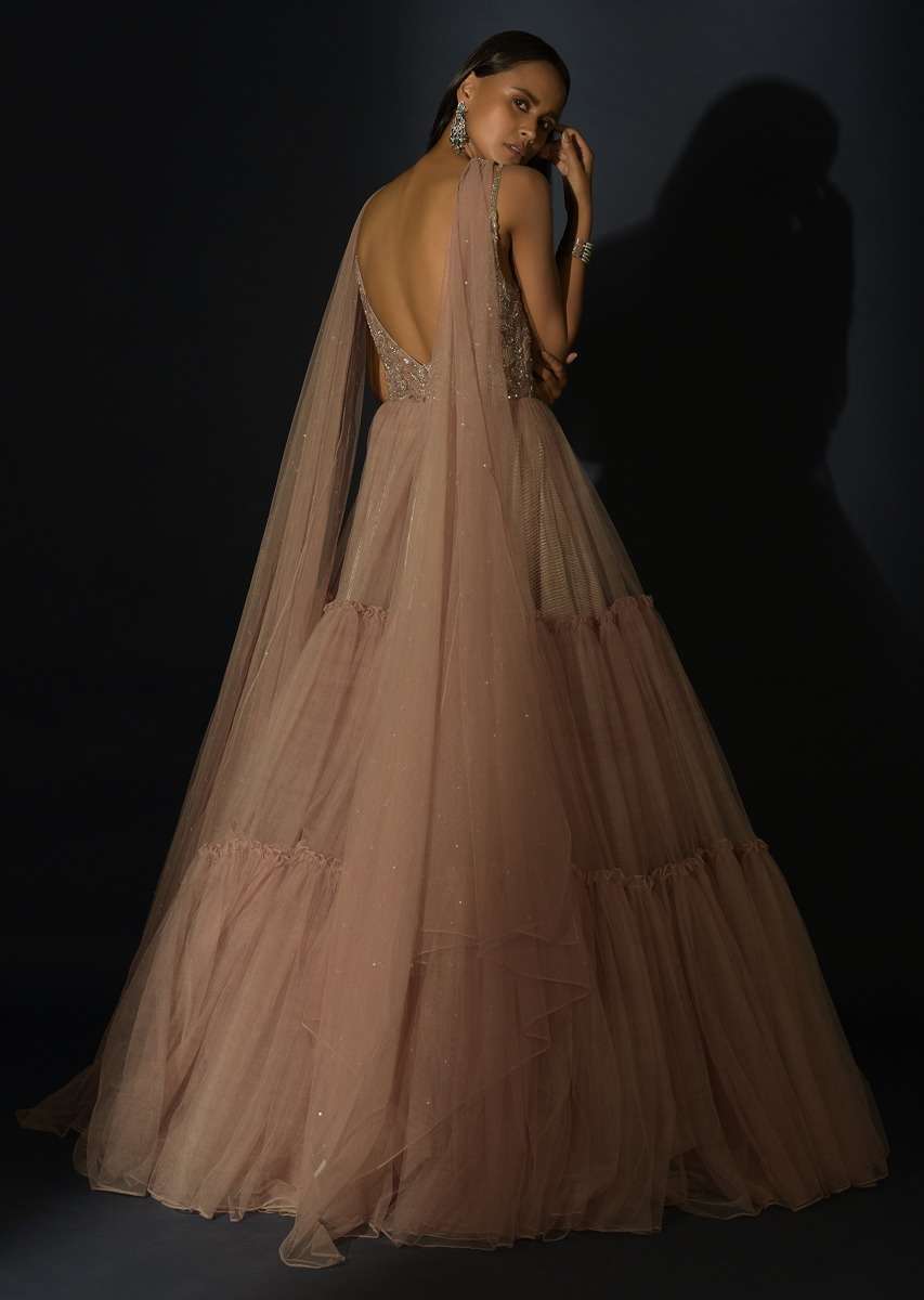 Champagne Tiered Gown With An Embellished Plunging V Cut Bodice And Shimmer Underlayer