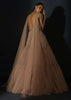 Champagne Tiered Gown With An Embellished Plunging V Cut Bodice And Shimmer Underlayer