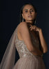 Champagne Tiered Gown With An Embellished Plunging V Cut Bodice And Shimmer Underlayer