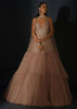 Champagne Tiered Gown With An Embellished Plunging V Cut Bodice And Shimmer Underlayer