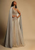 Champagne Embellished Gown With Plunging Neckline And A Fancy Choker With Attached Cape