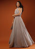 Champagne Gown In Shimmer Crush With Halter Neckline And Pleated Bodice Featuring Sheer Cut Out