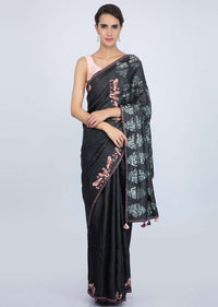 Charcoal grey tussar silk saree with batik printed pallo and bird patch work at the border only on Kalki