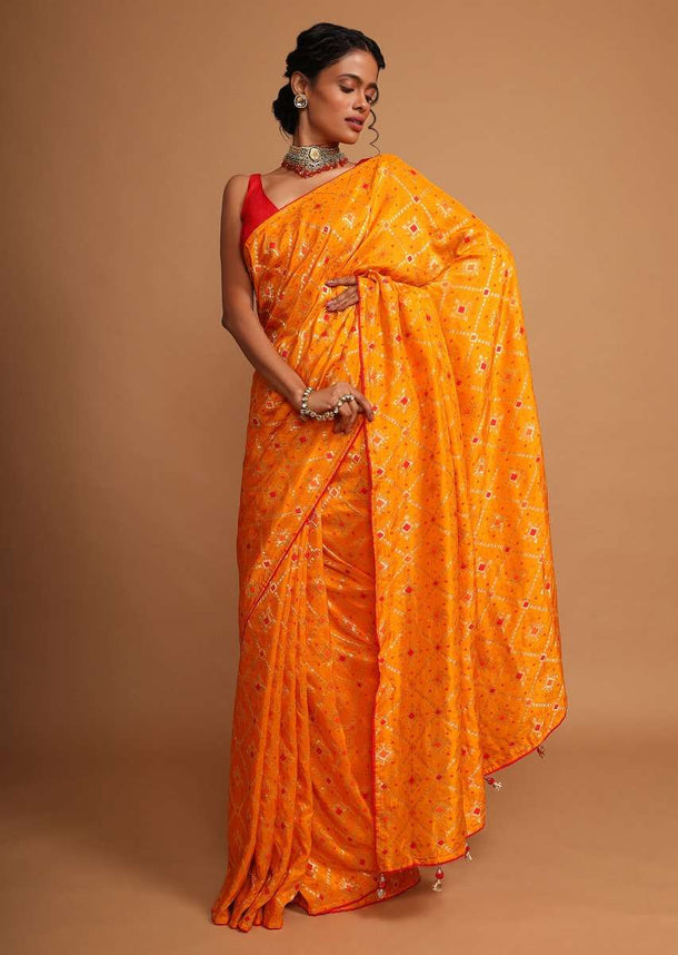 Chrome yellow bandhani printed dola silk saree with weaved work Online - Kalki Fashion