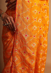 Chrome yellow bandhani printed dola silk saree with weaved work Online - Kalki Fashion